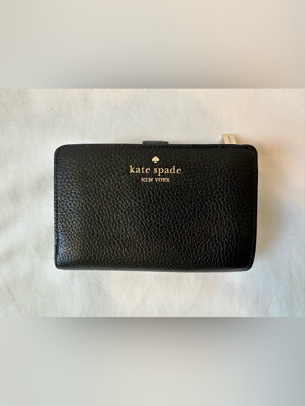 kate spade Leila Compact Black Pebbled Leather Bifold Zip Wallet with Gold Logo